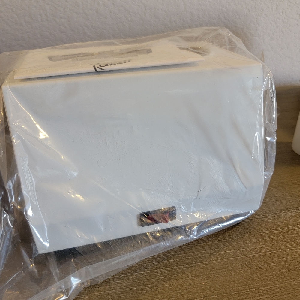 NEW Lottion Bottle Warmer - Never been used - Holds 2 bottles